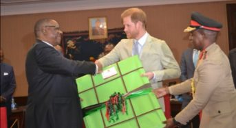 Britain’s Prince Harry swaps gifts with Mutharika