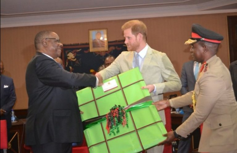 Britain’s Prince Harry swaps gifts with Mutharika