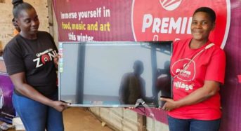 Liquor seller wins two  plasma TV screens in Premier Lotto Village promotion