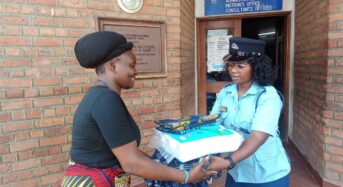 Chileka Police Officer donates to patients at Q.E.C.H